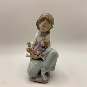 SOLD LLADRO Thoughtful Caress Girl Holding Doll Figurine #5990